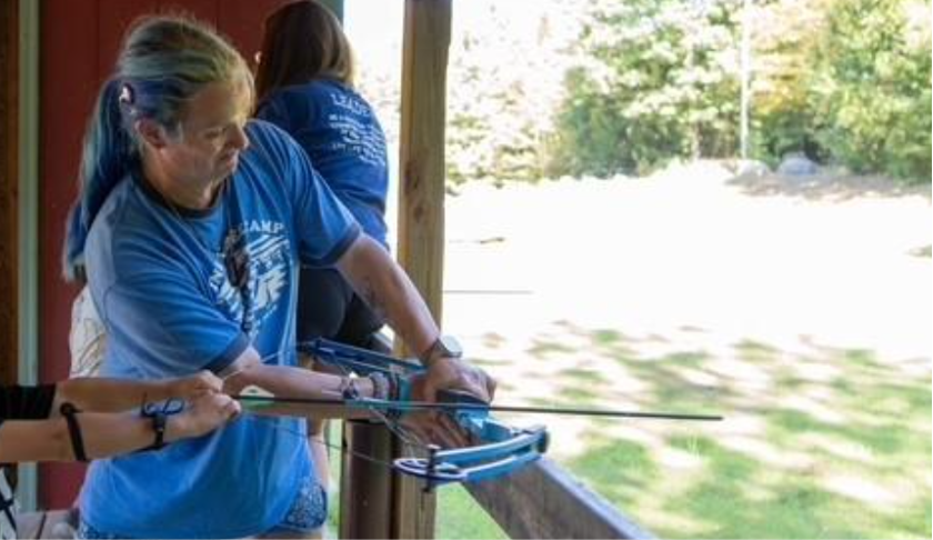 Hailey Brunk participating in an outdoor activity, showcasing living with hearing loss and her cochlear implant experience with Advanced Bionics.