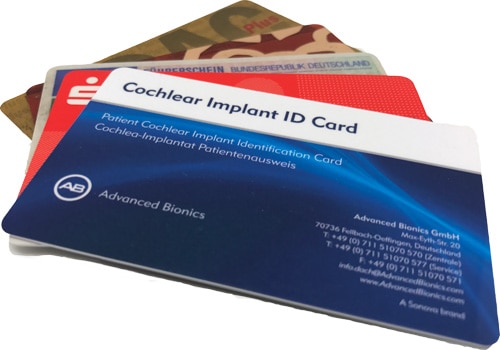 An image of four ID cards on display