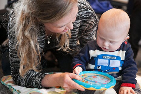 a mother playing with child