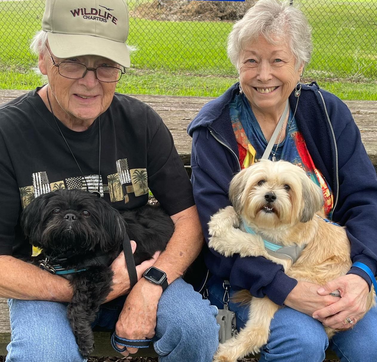 Blog author Erika Anderson Beale with her partner and two dogs