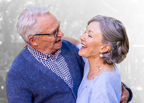older couple dancing in the yard