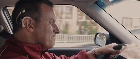 screenshot of J.P. Giuliotti wearing a cochlear implant in a movie