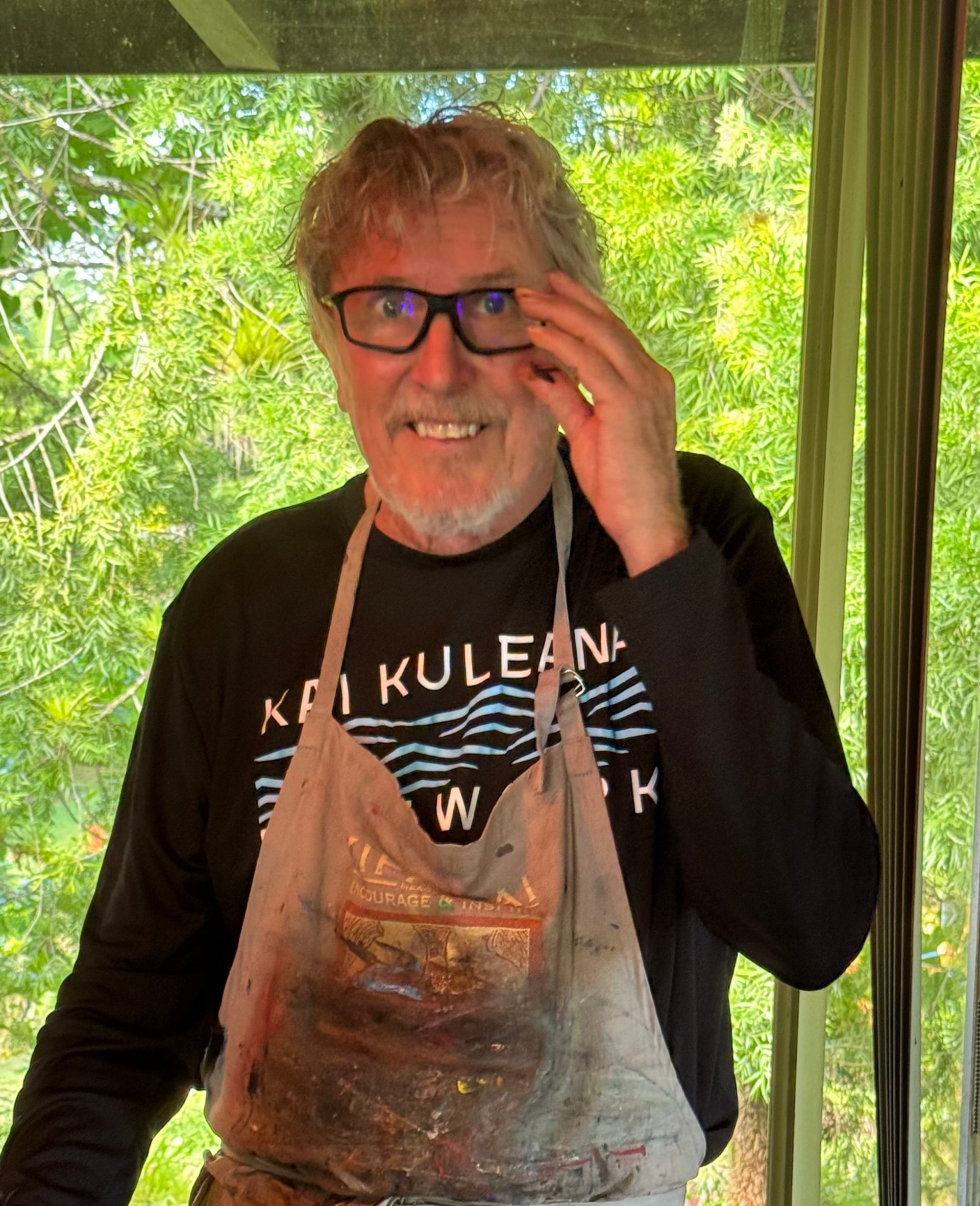 blog author Bob Doglas smiling and adjusting his glasses