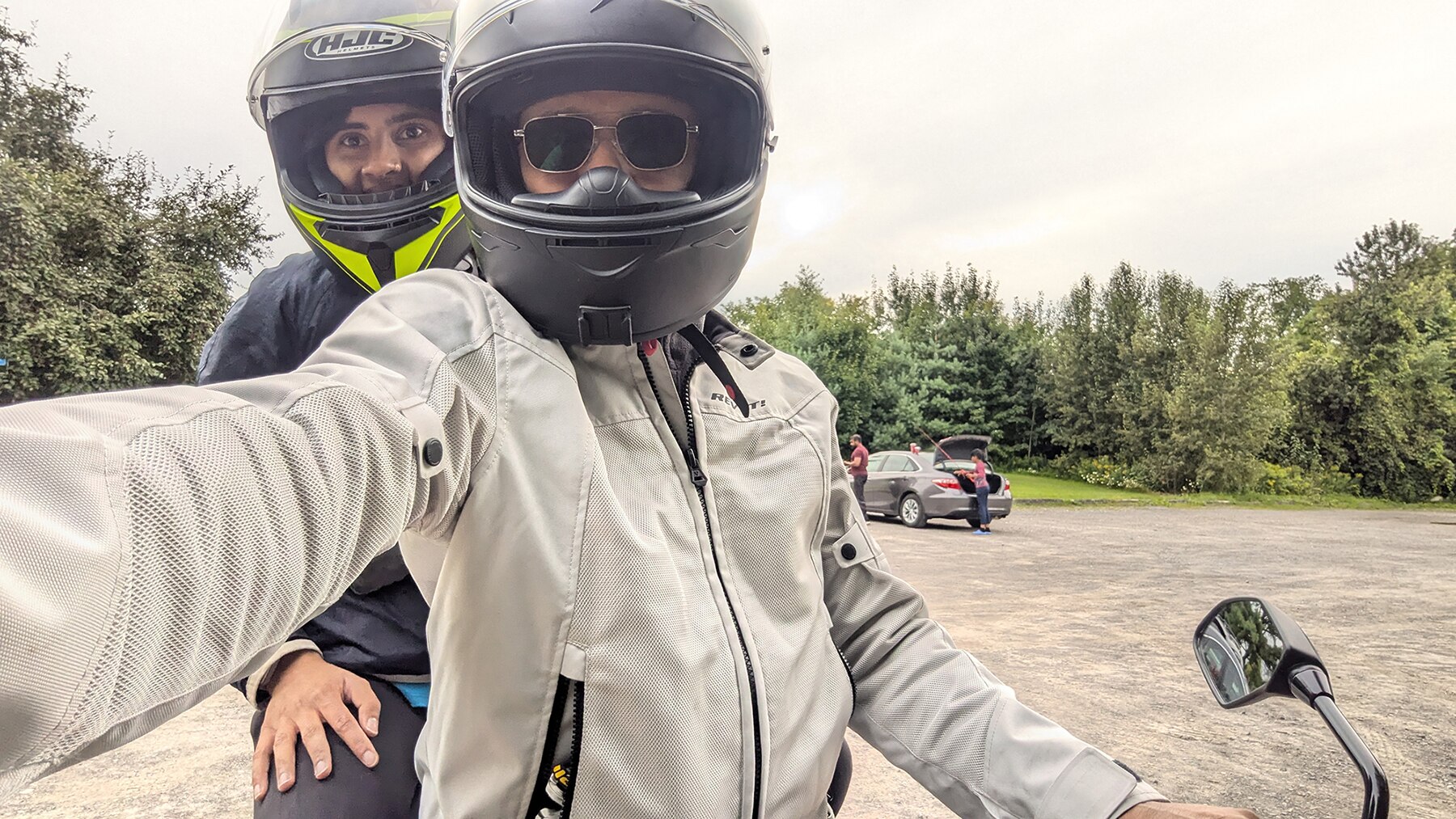 Shobana enjoying riding a motorcycle with her dad.