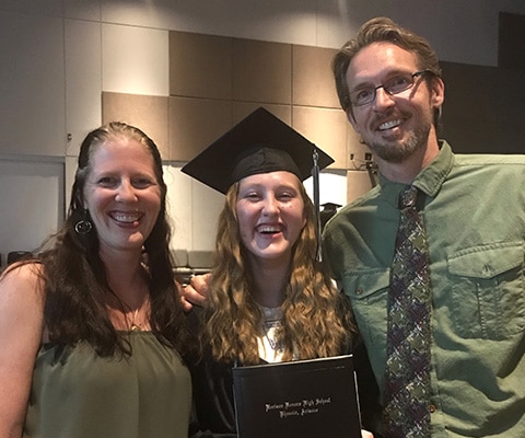 Blog author poses with daughter who has a cochlear implant