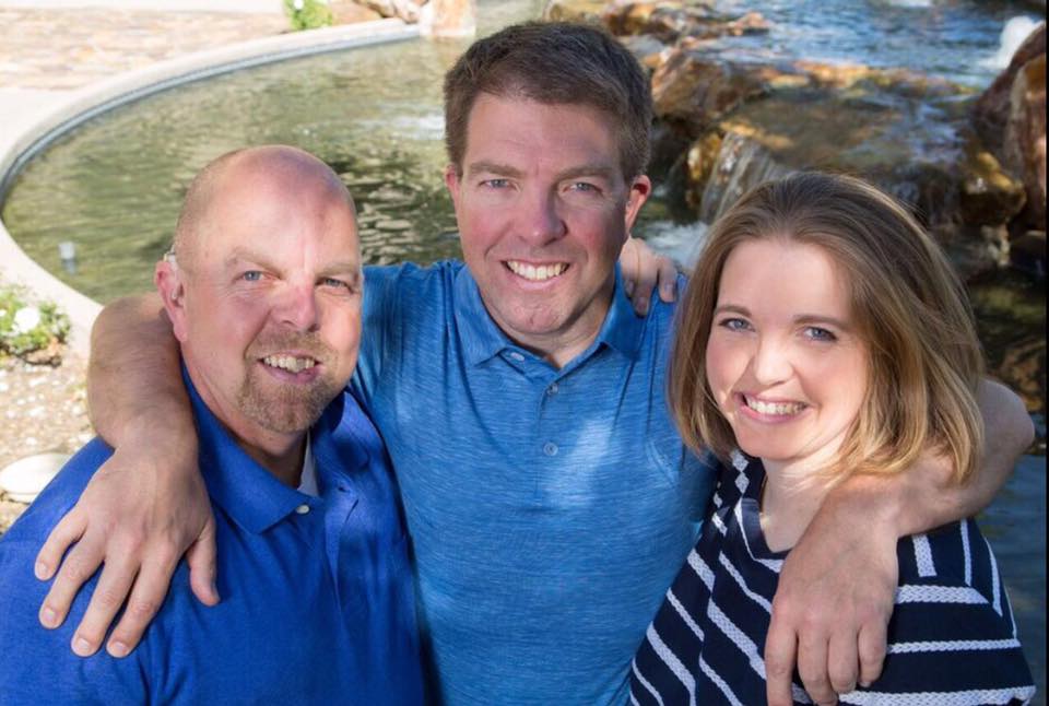 three adult siblings, two men and one woman, who are all AB cochlear implant recipients