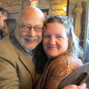 Elizabeth Brinkama and her partner posing for a picture