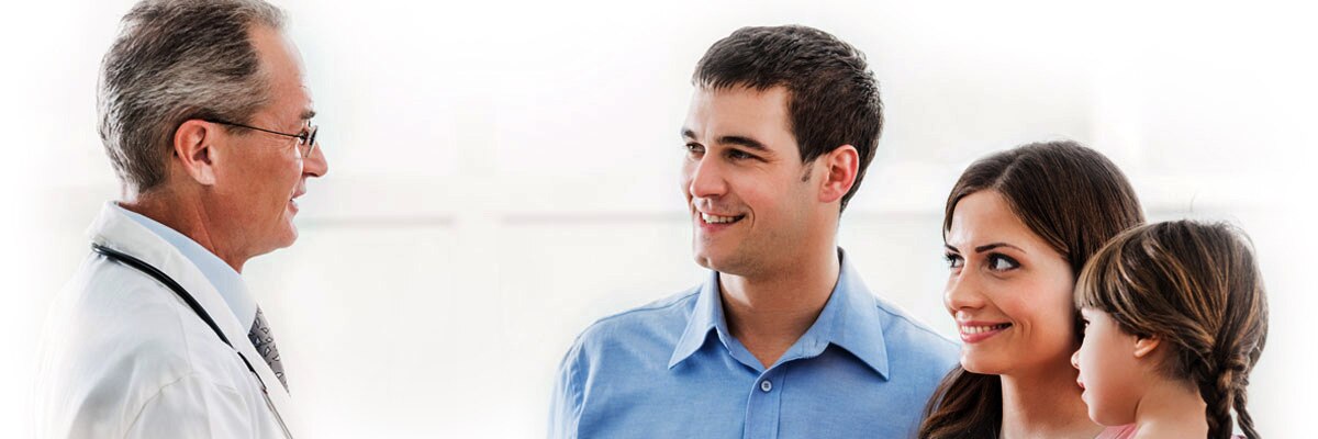 A medical doctor speaks to some patients