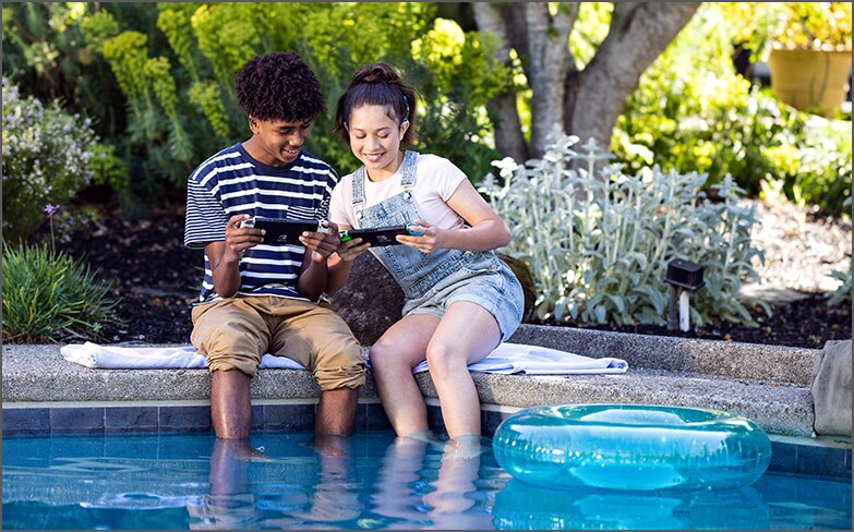 thumbnail friends playing games at the pool