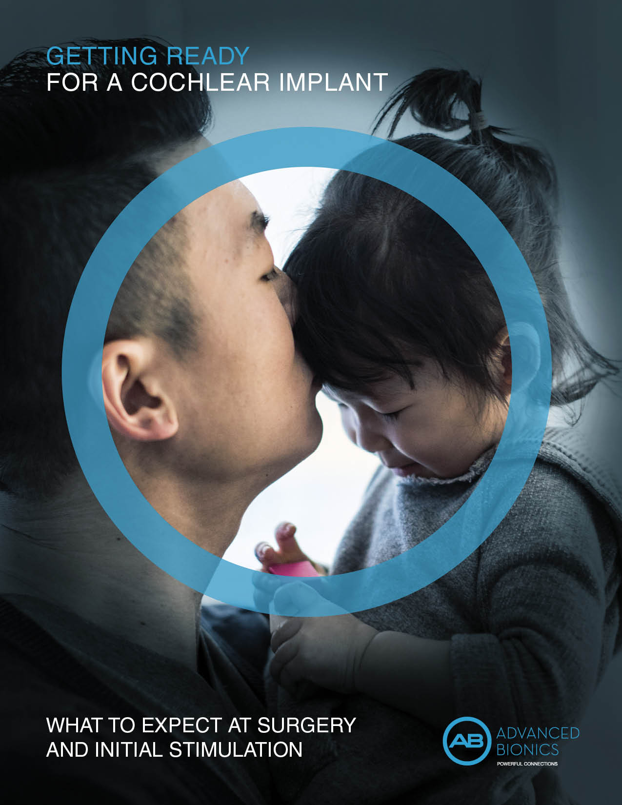 The front page of the brochure shows a parent kissing his child