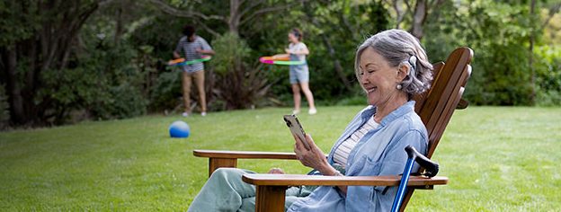 a mature cochlear implant recipient using a remote programming on mobile device
