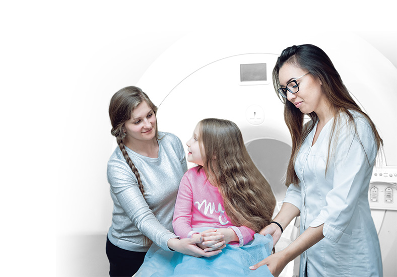 A child with a cochlear implant gets an MRI scan