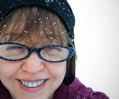 The blog author with a cochlear implant takes a selfie in the snow.