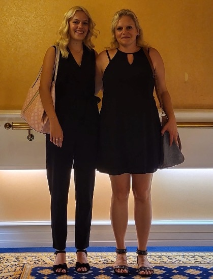 Mia and her mother, who supported her during her bilateral cochlear implant journey.