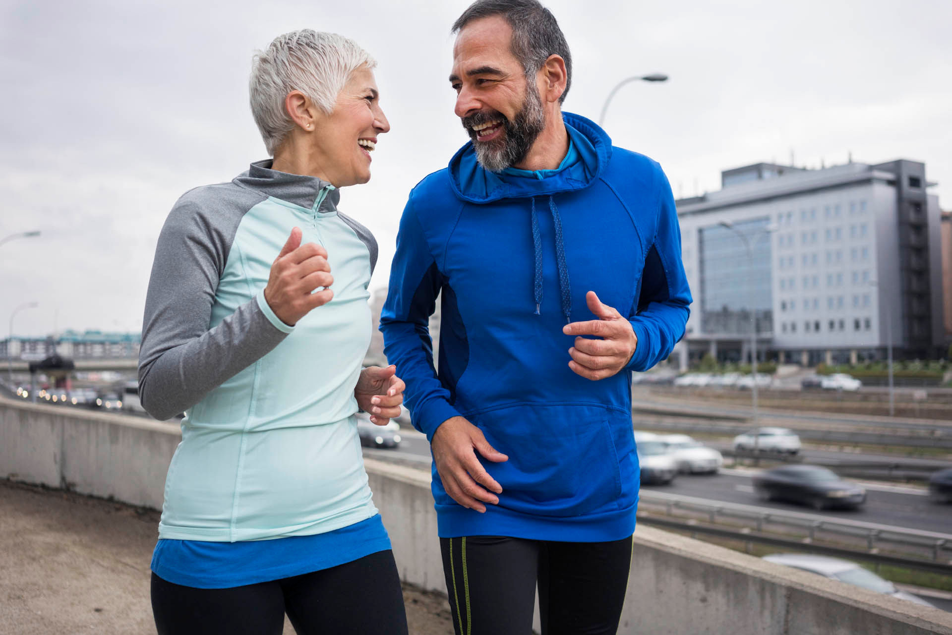 mature couple jogging outside